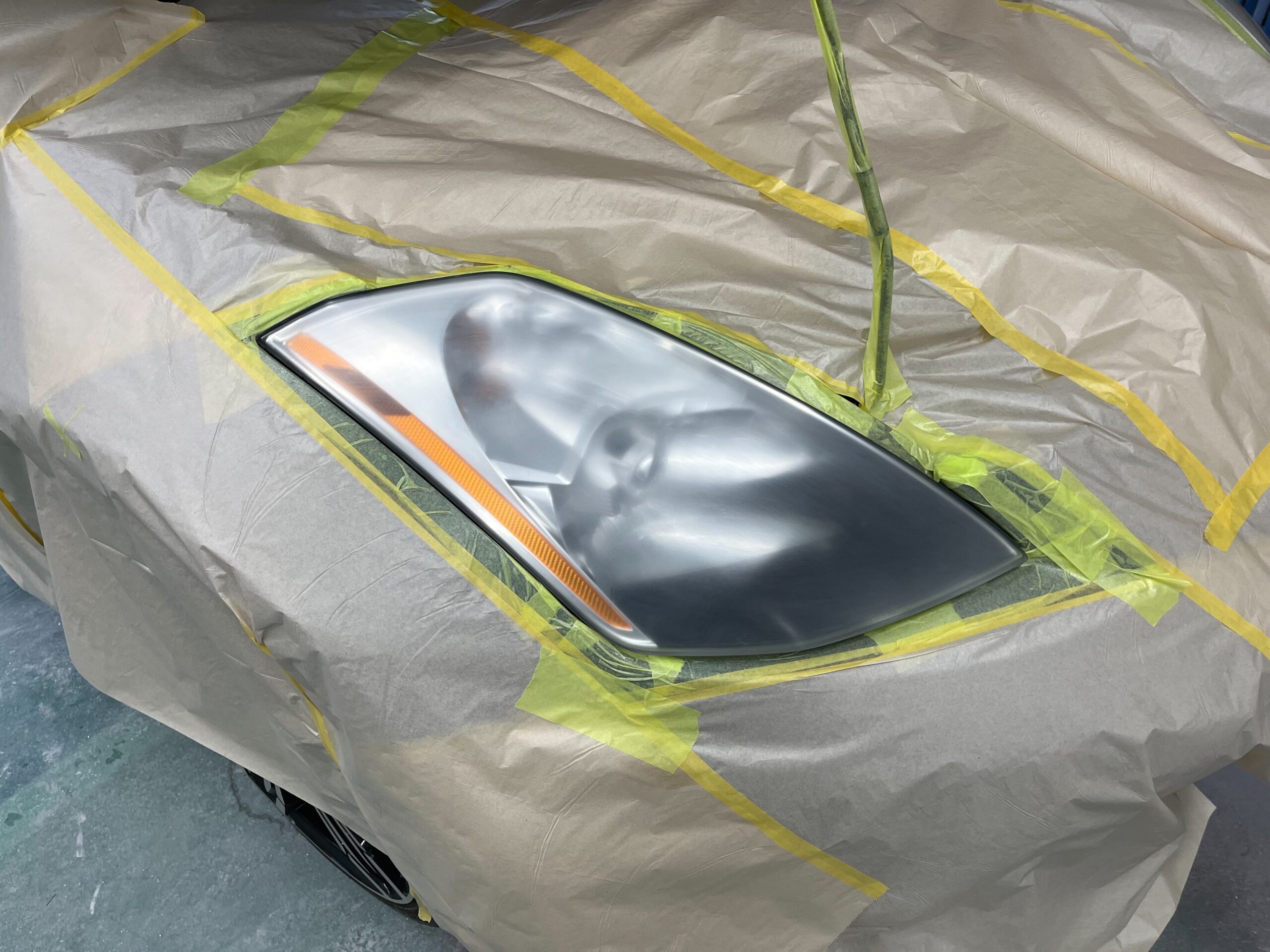 日産 フェアレディZ ヘッドライトクリア剥がれ再塗装の修理事例